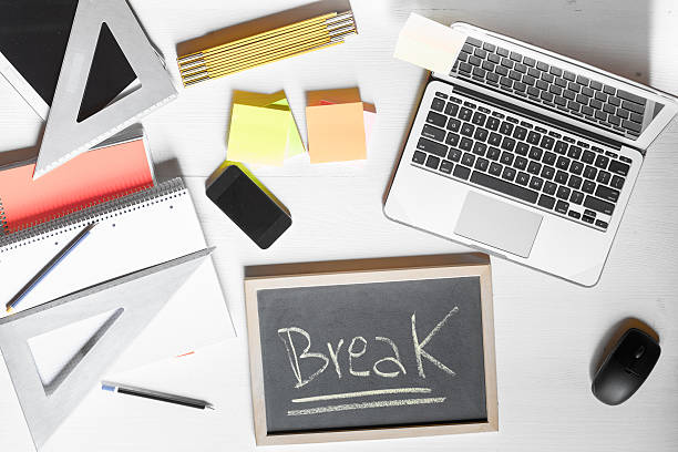 Office worker following micro break checklist at desk